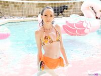 Smoking hot petite spinner Aria Haze peels off her swimsuit and gets her bare pussy pounded by a toy and a hard cock